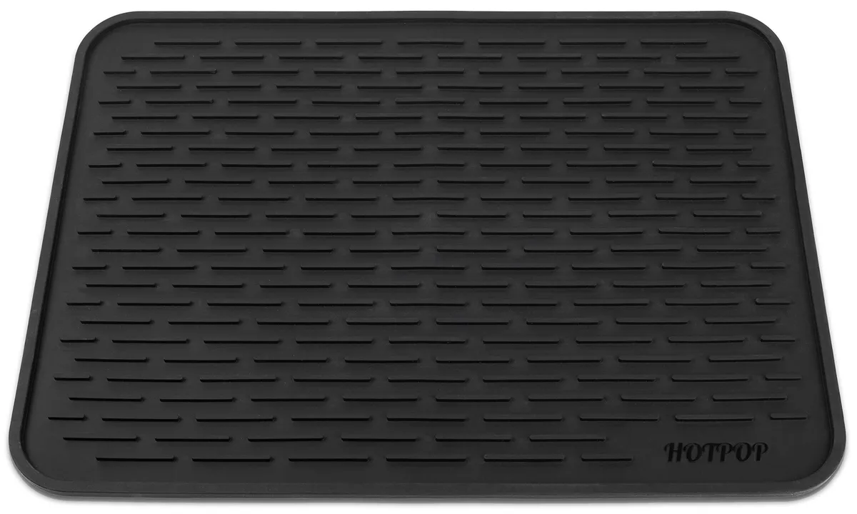 Rectangular black silicone drying mat with raised ridges, 24 by 18 inches