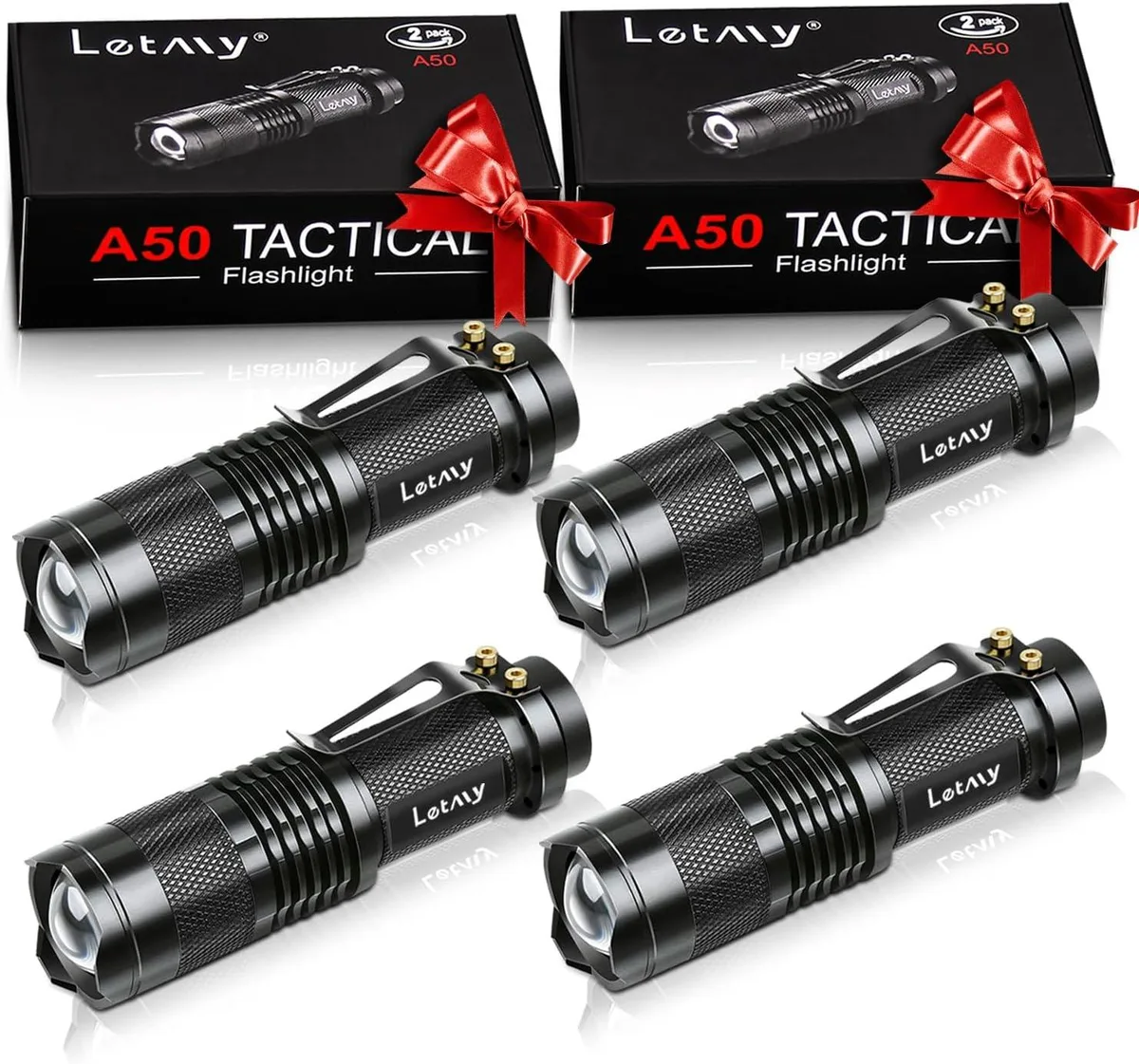 Four small silver flashlights with belt clips side by side