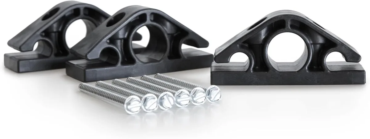 Three white wall-mounted clips with three attachment points each, mounting hardware and poster