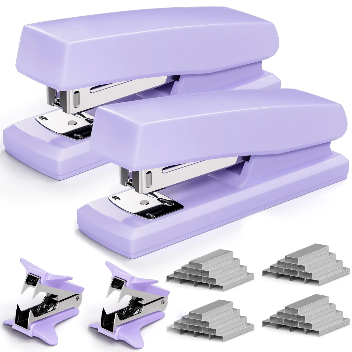Two purple plastic staplers with matching removers and staple boxes