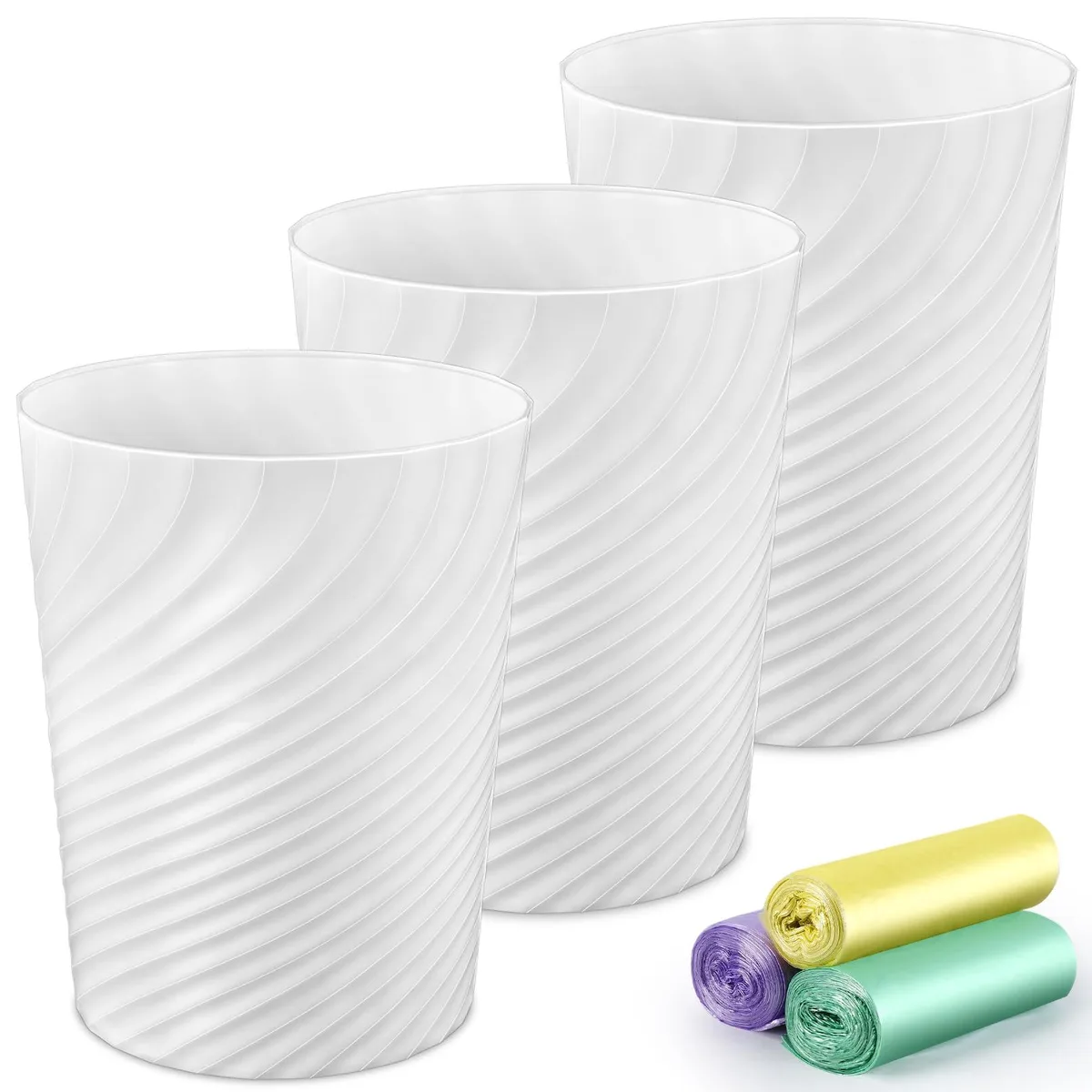 Three white round plastic waste baskets with textured finish