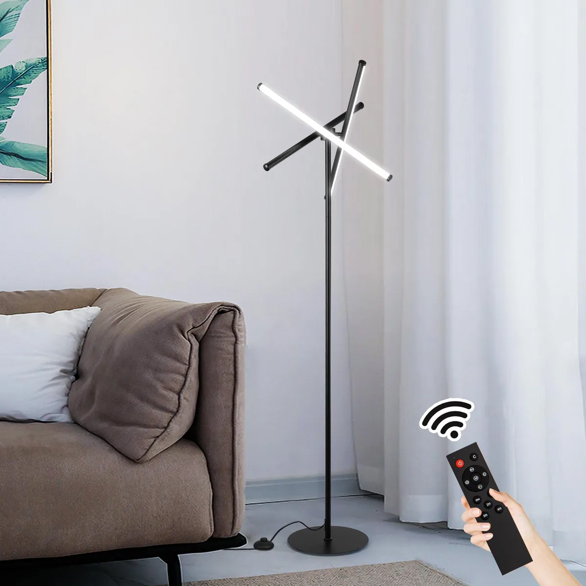 Tall black iron floor lamp with three adjustable LED light heads on a slender stand