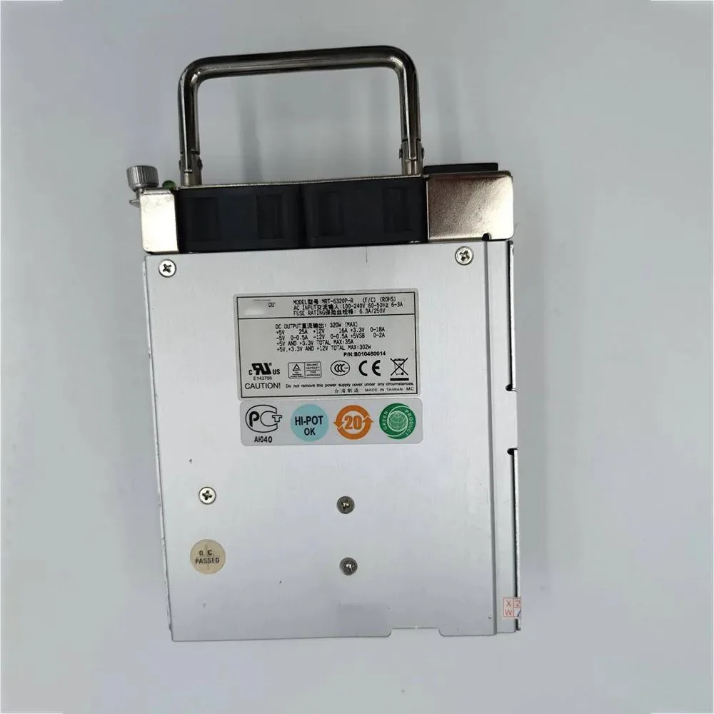 Rectangular silver server power supply unit with rear fan grille and power socket