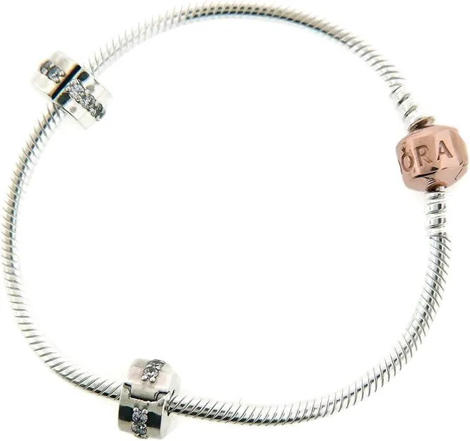 Rose gold sterling silver bracelet with clasp, two clips and a charm