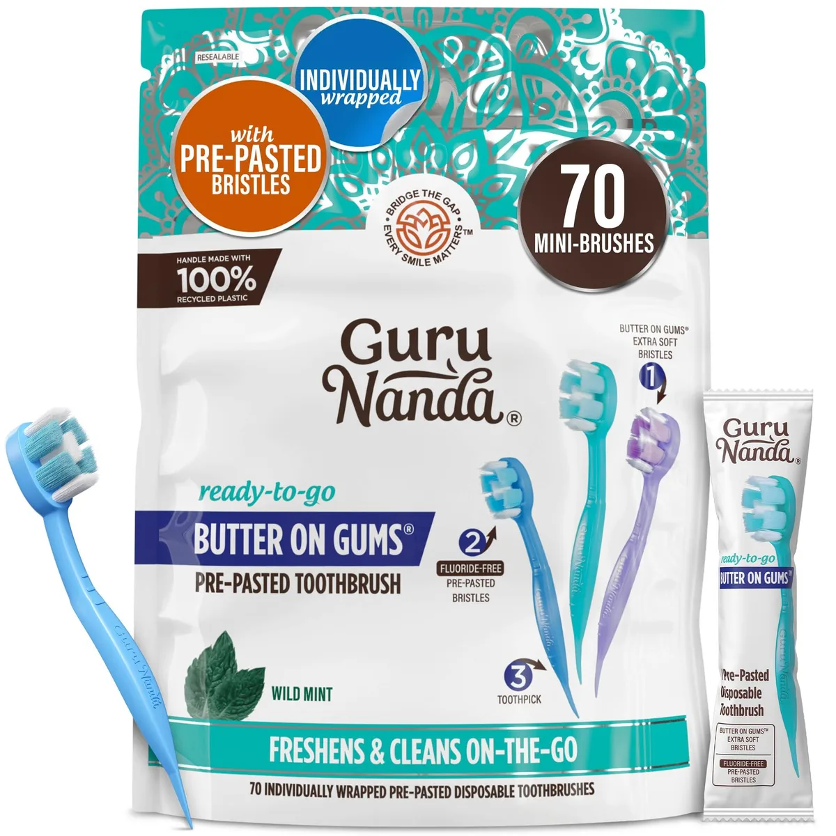 A rectangular box containing 70 individually wrapped mini disposable toothbrushes in multicolor packaging