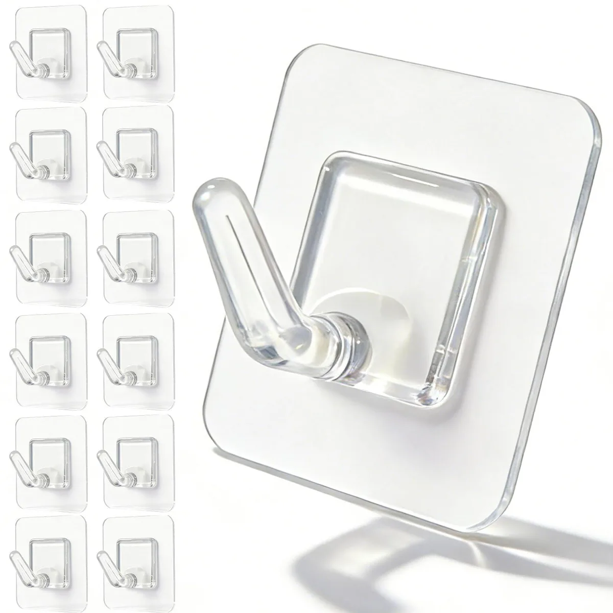 Twenty clear adhesive wall hooks in a pack