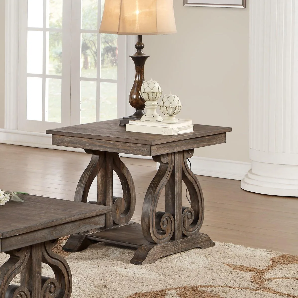 Wooden end table with distressed dark oak finish and scrolled base supports