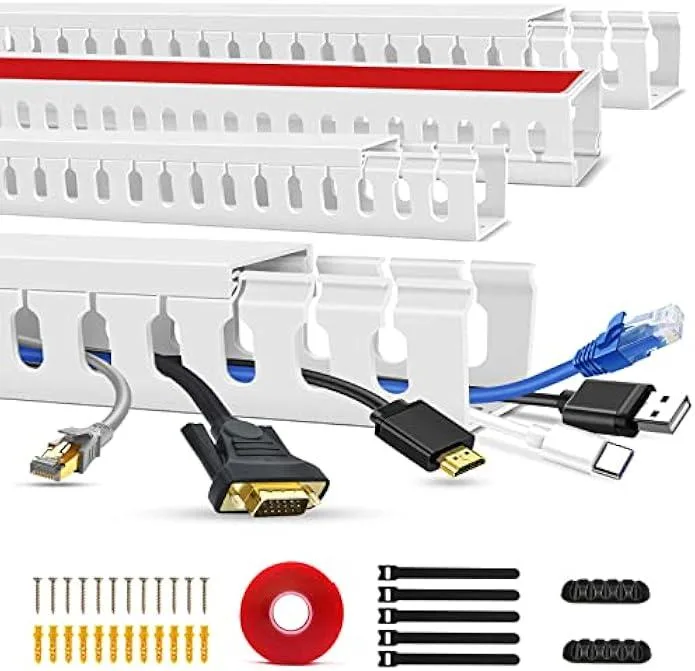 Four white PVC cable raceway channels with open slots, adhesive tape, screws, cable ties and wire organisers