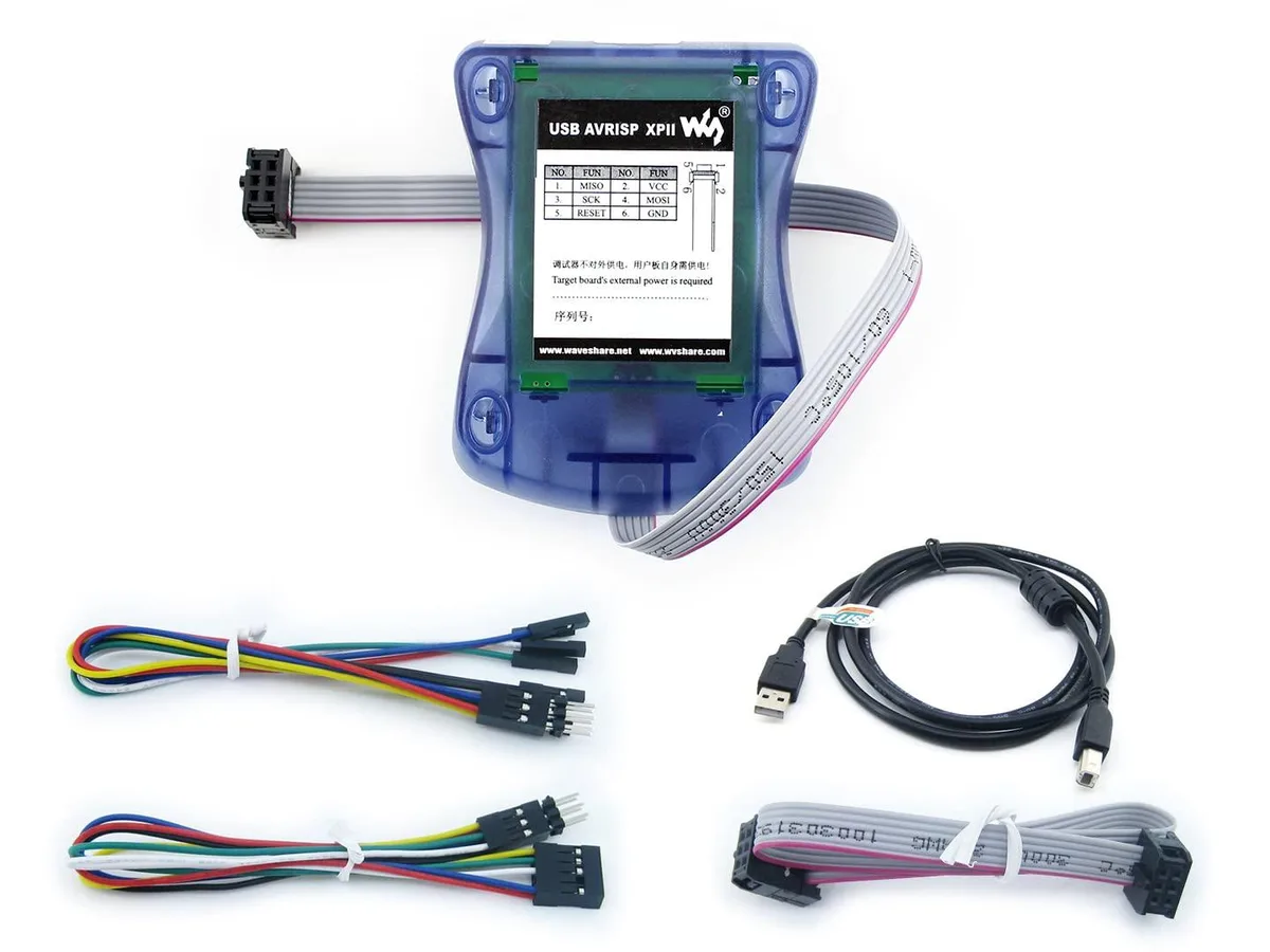 Small green circuit board with USB connector and three ribbon cables