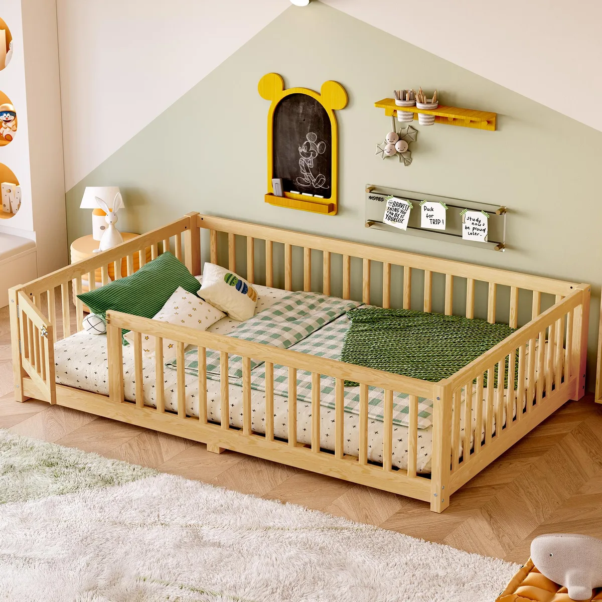 Low pine floor bed with guardrails and a small door, natural finish