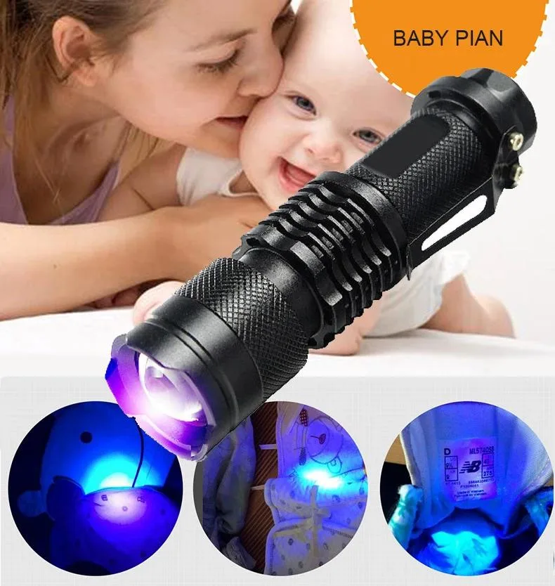 Black cylindrical UV flashlight with zoomable head and tail switch, takes AA or 14500 battery