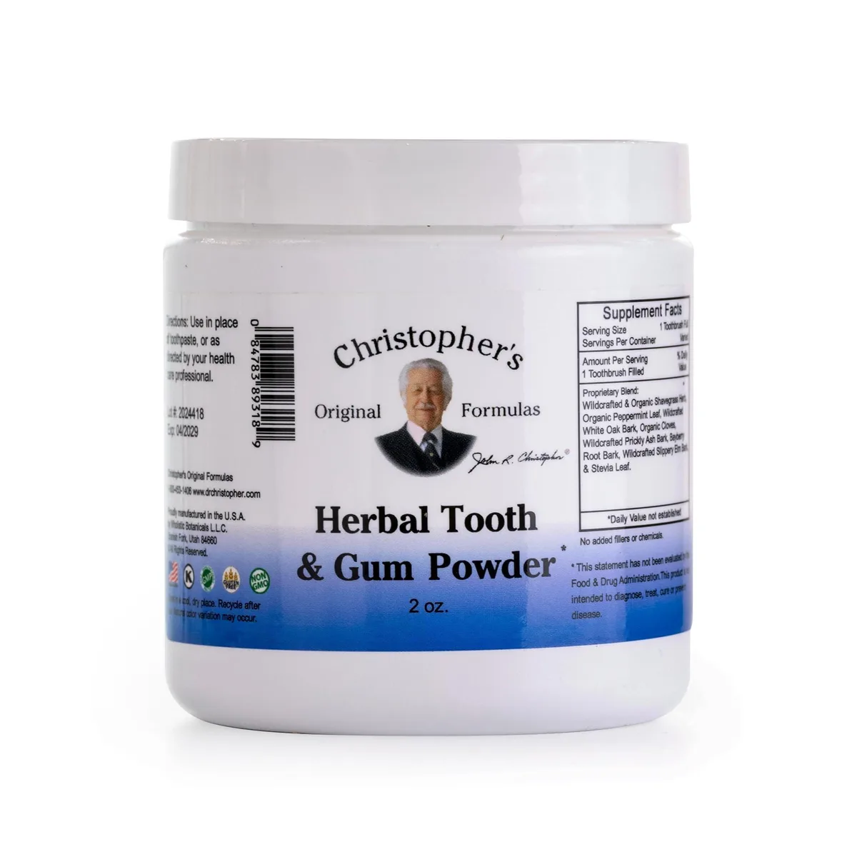 Small round jar of light herbal tooth powder
