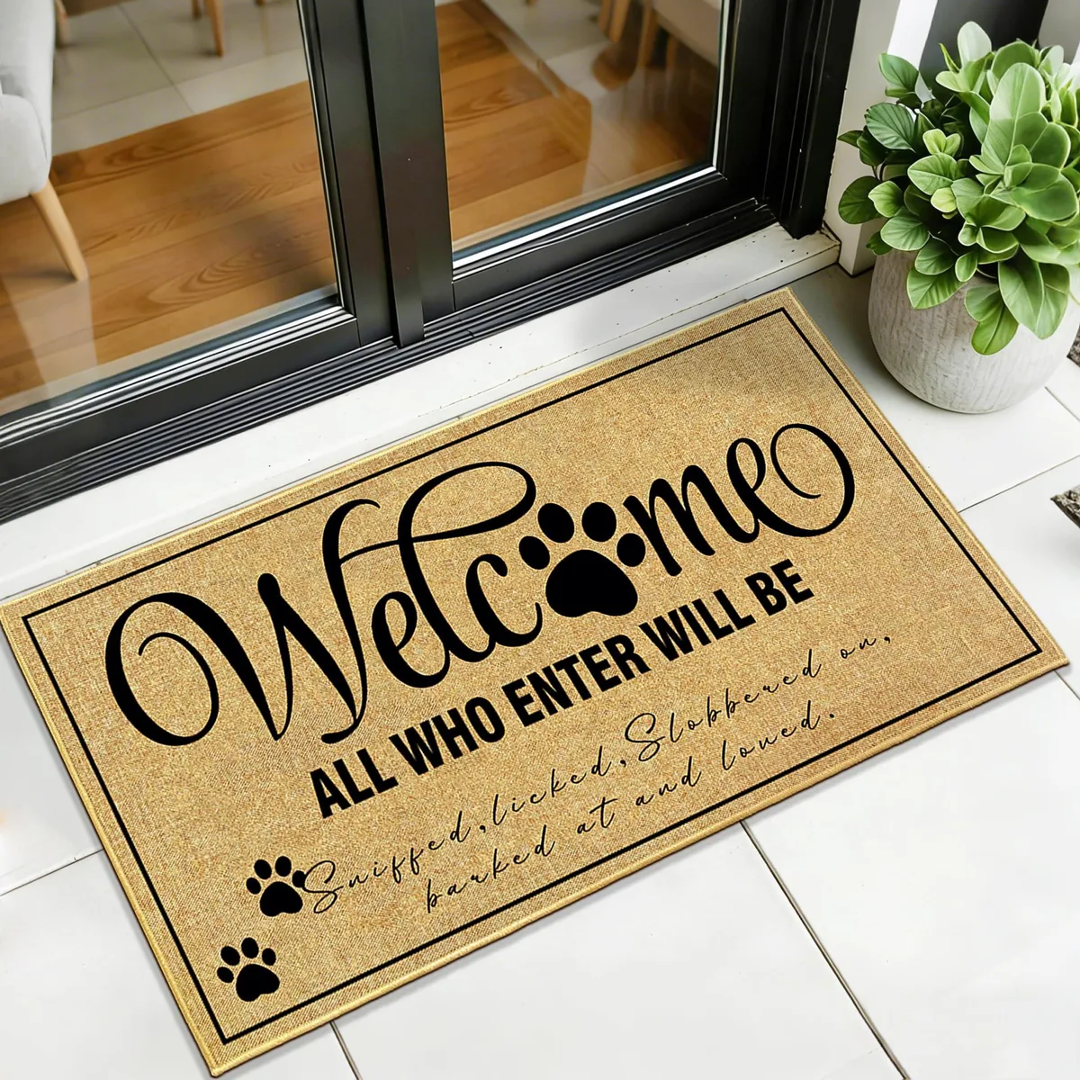 Rectangular coir doormat with "Welcome" text, natural fibres, dark rubber backing, 17 by 30 inches