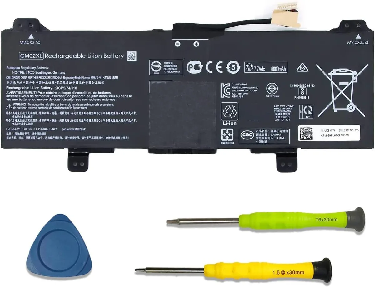 Rectangular black lithium-ion laptop battery pack with label showing 47.3Wh 7.7V