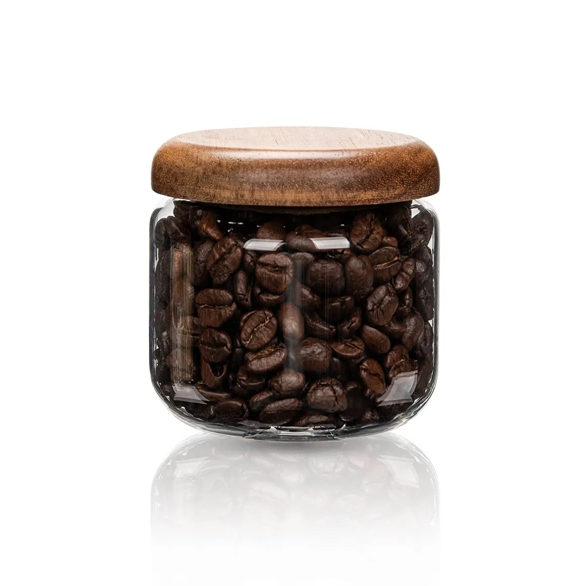 Clear glass food storage jar with wooden lid, 3.4 by 3.4 by 2.8 inches