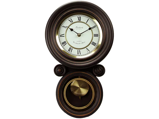 Round black wall clock with wooden case, gold accents, roman numerals and brass pendulum