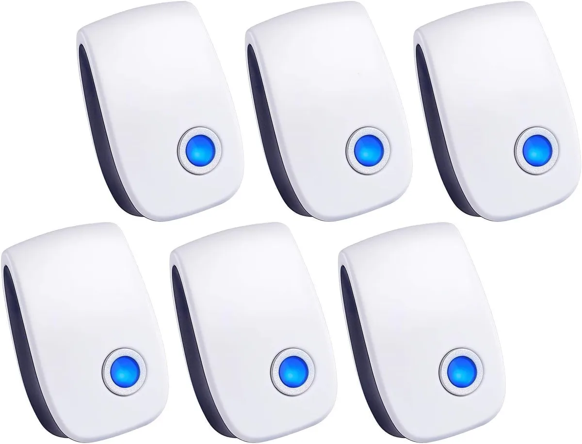 Six white plastic plug-in pest repellers with compact rectangular shape