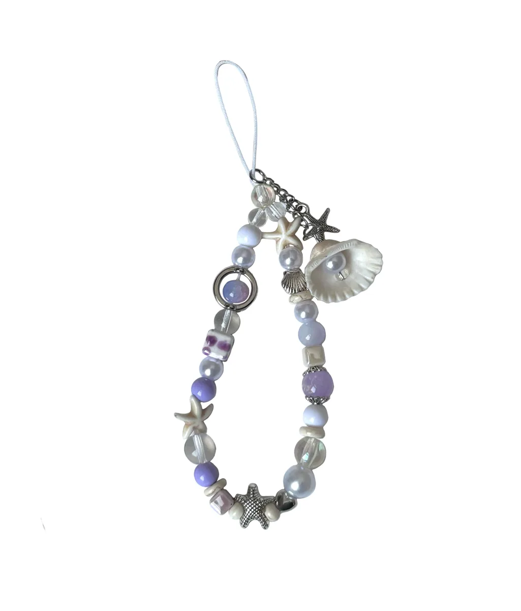 Purple resin starfish charm on a beaded wrist strap, 4.7 inches long
