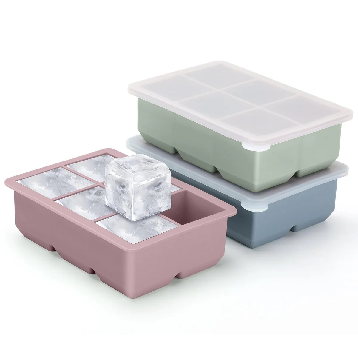 Three square silicone ice cube trays with removable lids, each tray holding six 1.9-inch cubes, shown in assorted colours