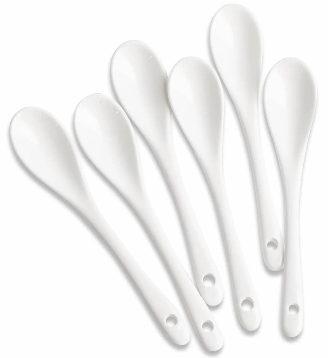 Six white porcelain spoons with round handle holes, 5 inches long