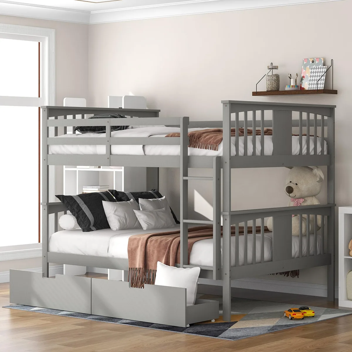 Gray solid wood full-over-full bunk bed with integrated drawers and ladder