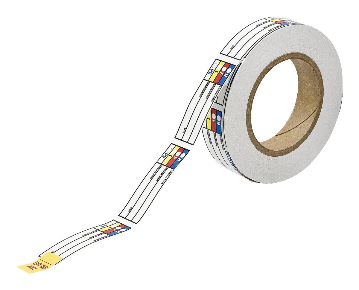 Stack of 720 rectangular paper chemical labels, 1in by 3in, multicolour print on white background