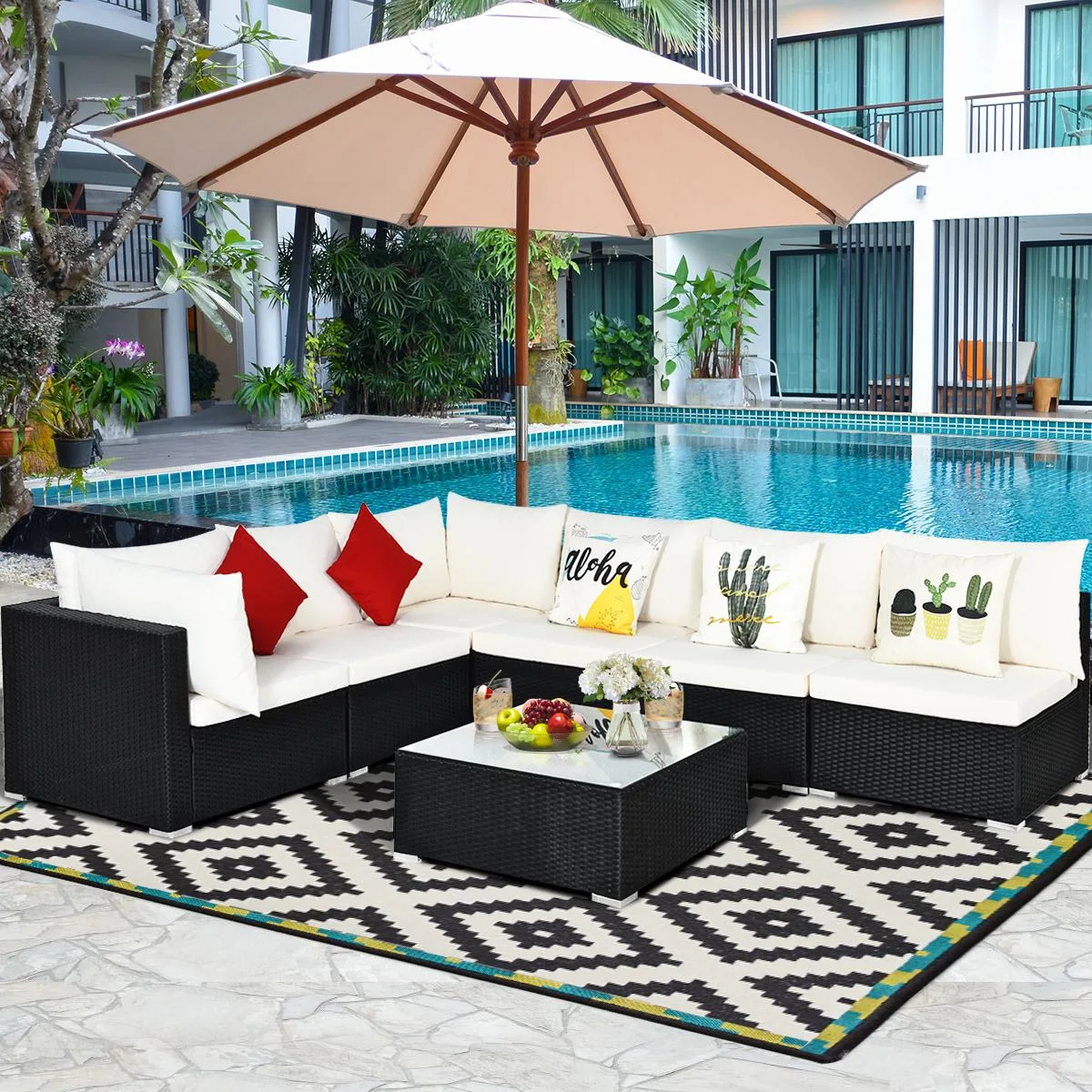 Beige 7-piece rattan sectional set with coffee table