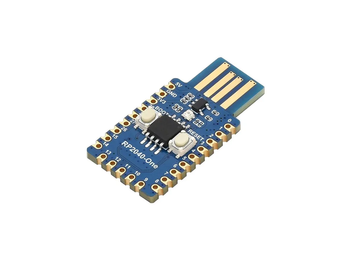 Small green PCB development board with integrated USB-A plug and castellated edges