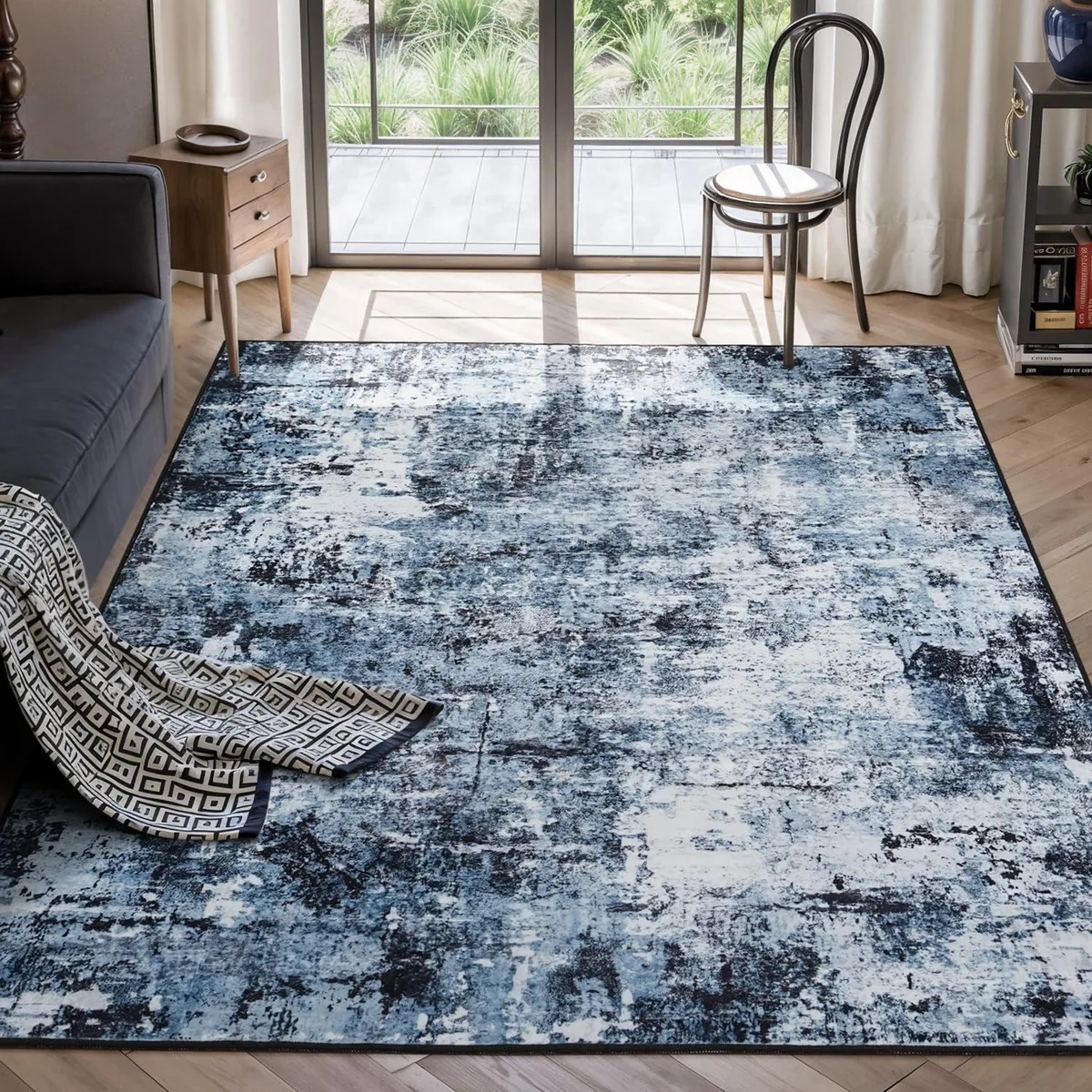 Rectangular navy blue rug with low pile and rubber backing
