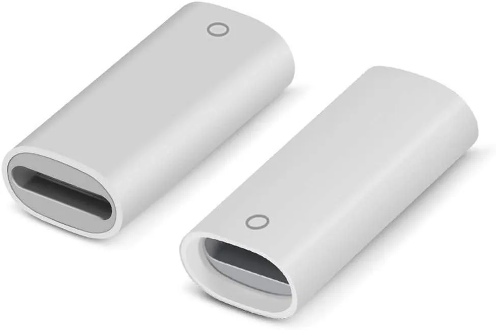 Two small white Lightning-to-Lightning adapters lying flat