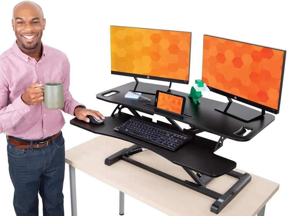 Black 37 inch sit-stand desk converter with keyboard shelf and monitor riser, matte finish, hydraulic lift