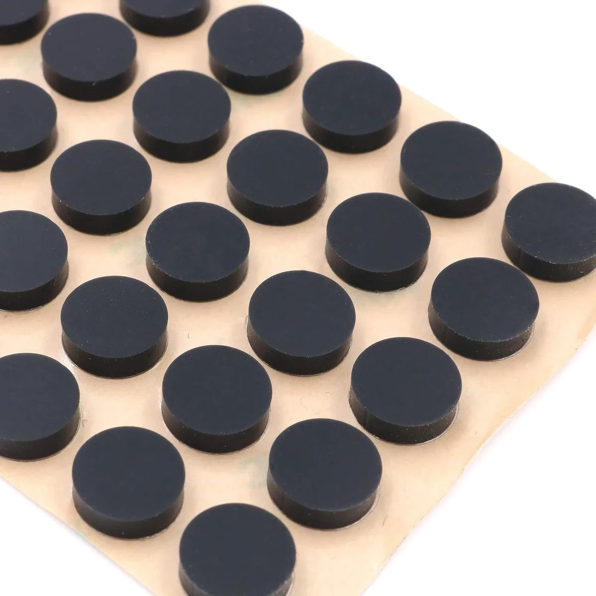 Black round silicone pads in a 100 pack with 3M adhesive backing