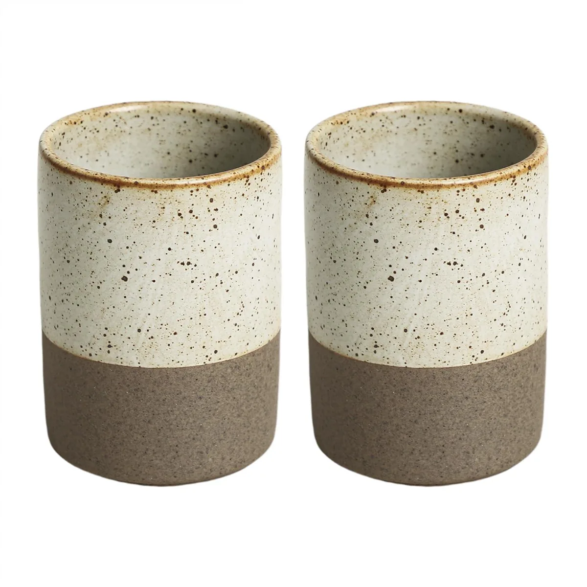 Two white ceramic mouthwash cups with vintage rust-spot finish