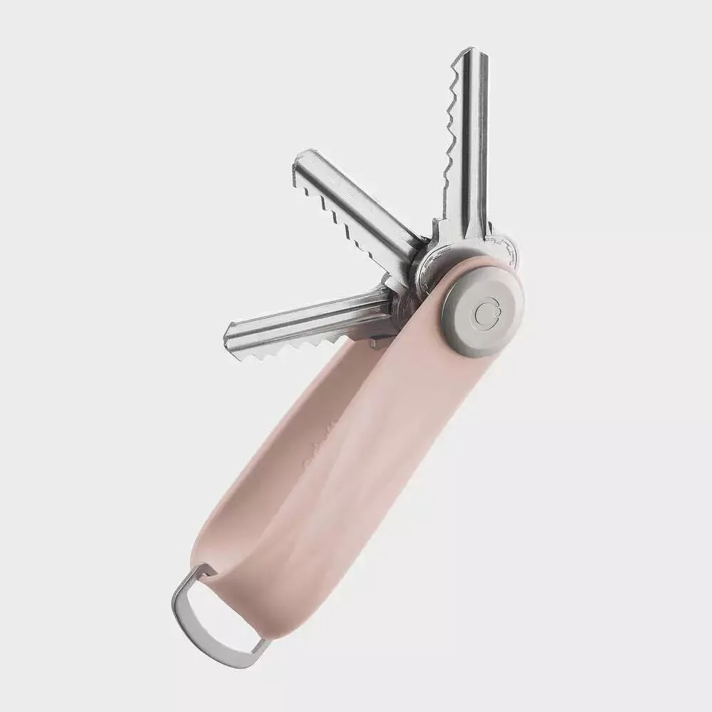 Orbitkey Slim rubber keyholder in dusty pink, compact weatherproof organiser with D-ring