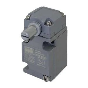 Small rectangular industrial limit switch with side rotary actuator, grey enclosure, surface mount holes visible