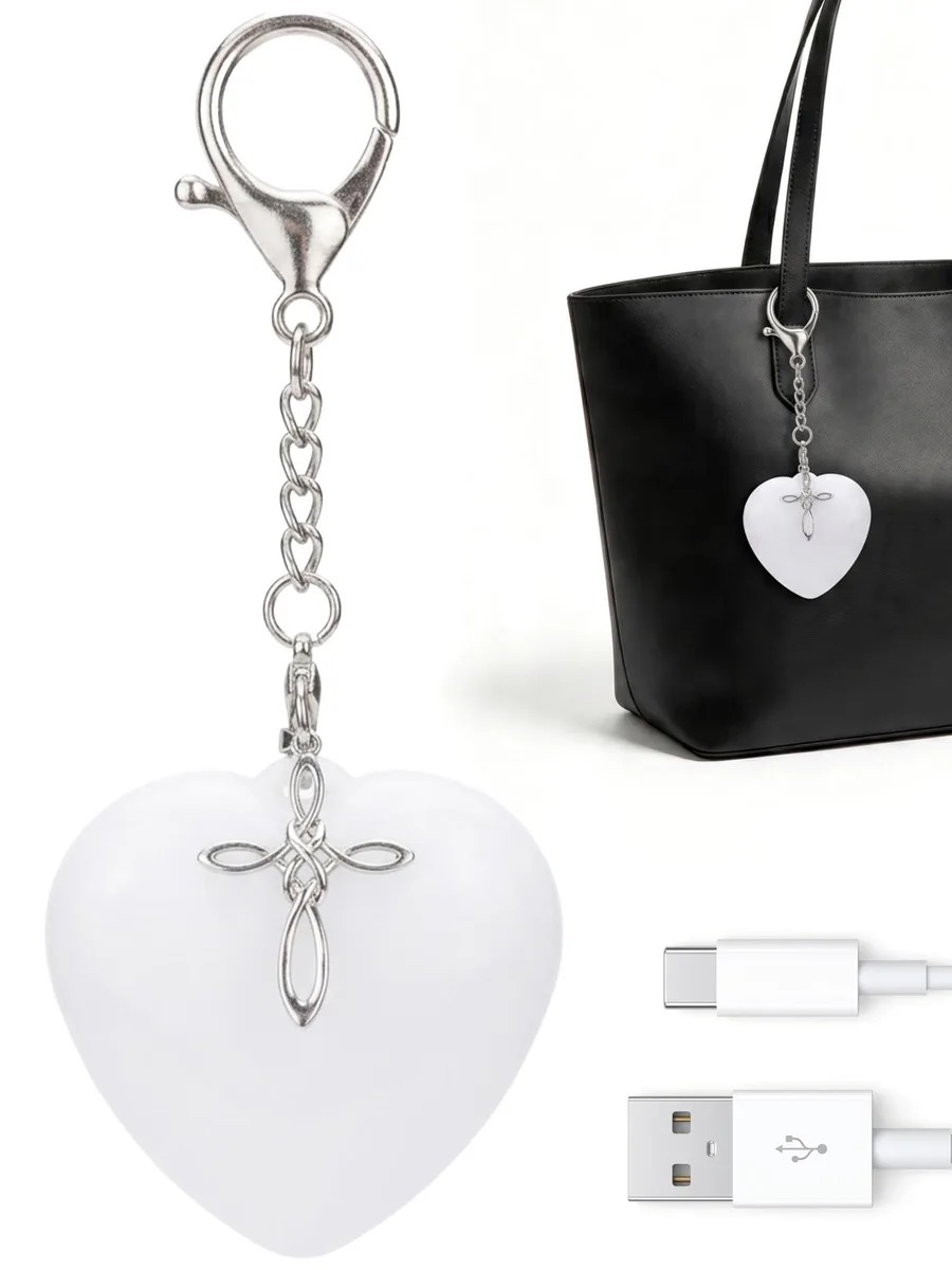 Silver heart-shaped LED purse light with cross pendant and keyring, touch-activated, rechargeable