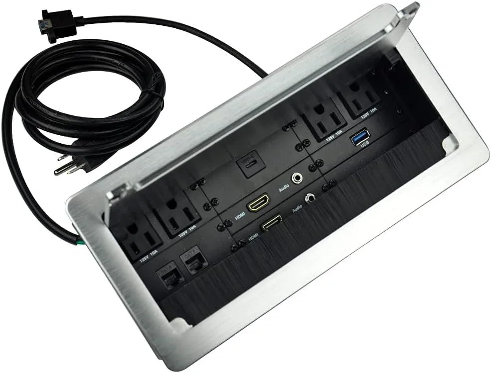 Silver aluminium connectivity box with flip-up brushed cover and multiple ports visible