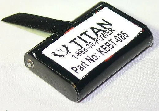 Rectangular two-way radio battery pack, dark plastic casing with metal contacts