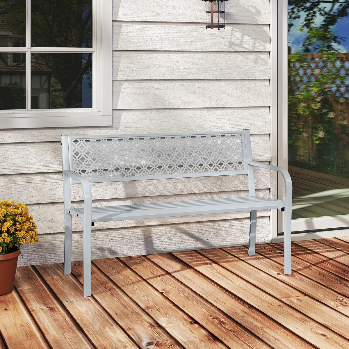 Grey metal garden bench with geometric lattice backrest and slatted seat, curved armrests, 50 inches wide