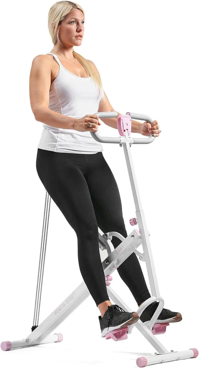 Grey metal squat trainer with padded seat, handlebars, LCD monitor and three elastic resistance bands