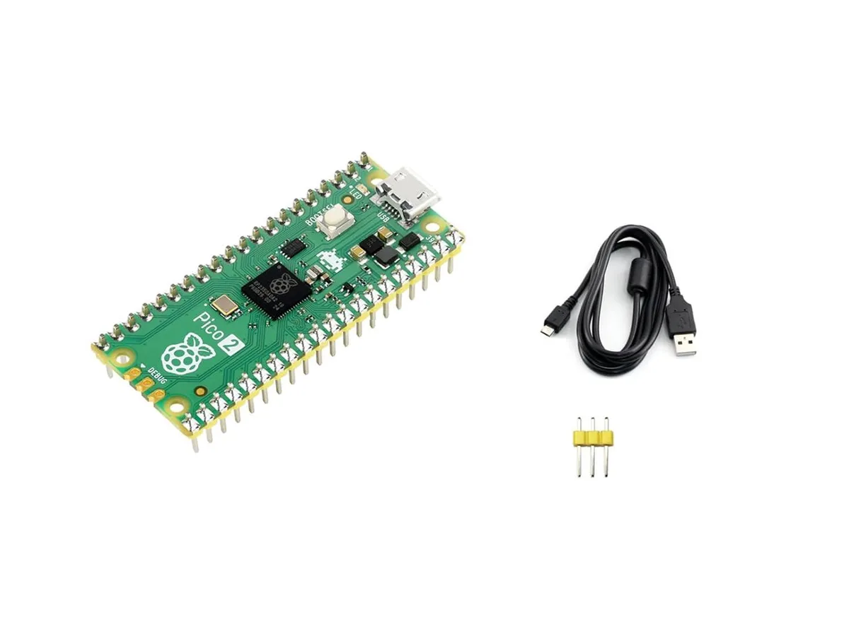 Small green circuit board with 26 gold header pins and RP2350 chip