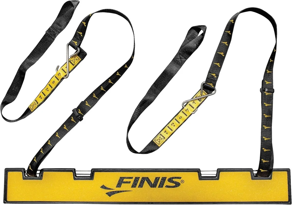 Black rubber wedge with five adjustable height settings on a pool starting block