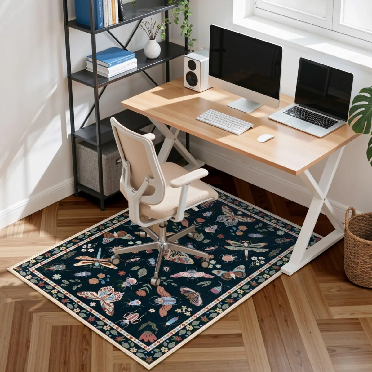 Rectangular black polyester chair mat with insect print, 36 by 48 inches