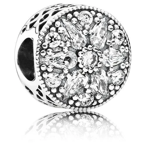 Sterling silver charm with pear-shaped cubic zirconia and cut-out hearts