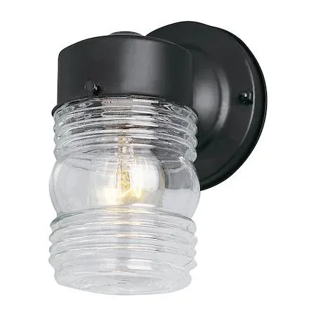 Black outdoor wall sconce with clear glass shade 4.5 inches wide