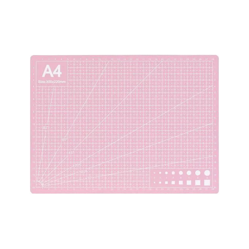 Green rectangular cutting mat with printed grid lines and angle guides