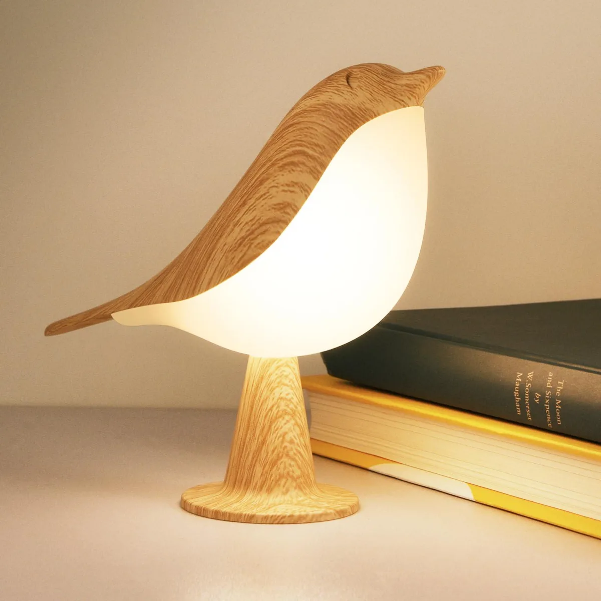 Small rectangular bird-shaped desk lamp with printed finish and touch control on top