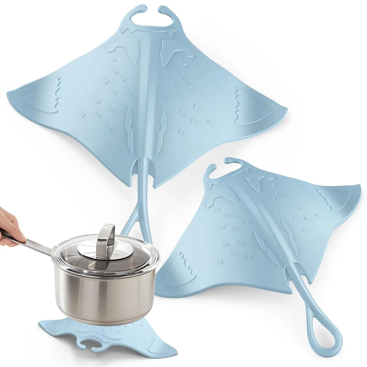 Two blue silicone manta-ray trivets with textured surface and curved tail loops