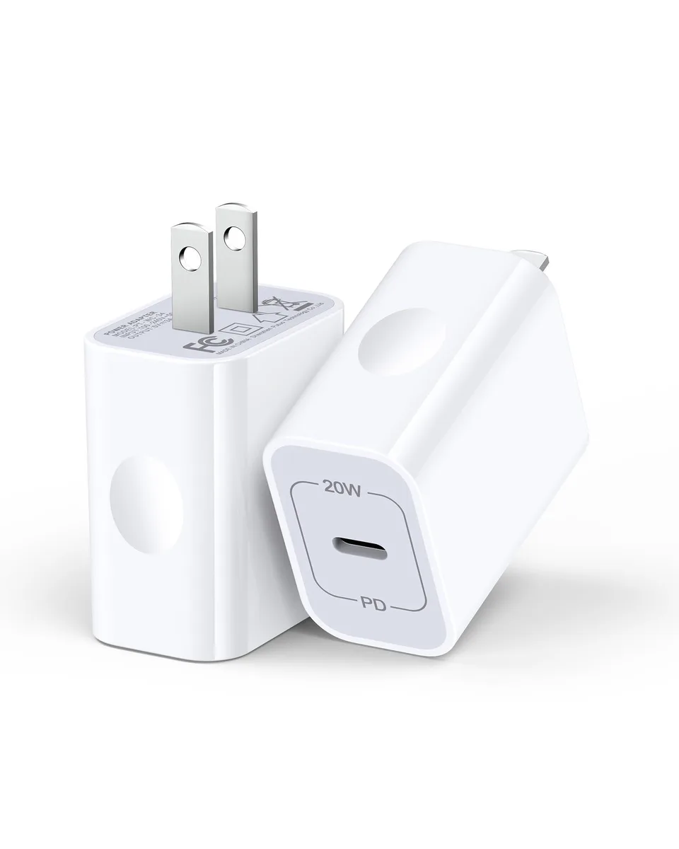 Two small white USB-C wall chargers with foldable plugs side by side