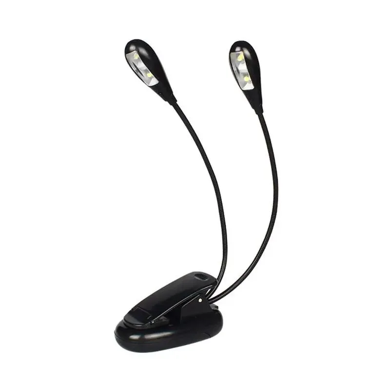 Two black flexible clip lamps with USB cables, coiled for storage